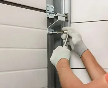 Garage Door Panel Replacement Performed by Technician